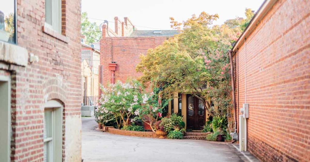 Garden through an alleyway in downtown Madison, Georgia