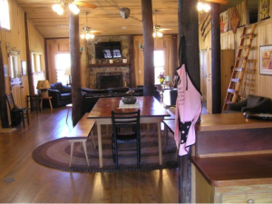 J&J Bunkhouse rustic airbnb living room in Rutledge | Where To Stay In Georgia | Places To Stay in Madison GA | Visit Madison