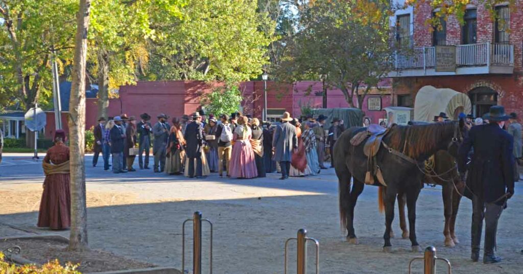 Horse and carriage and people in period dress for the filming of the Underground Railroad