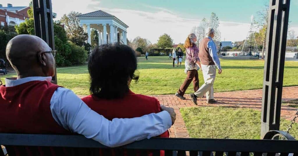 People enjoy a winter escape in Madison Town Park during the holidays