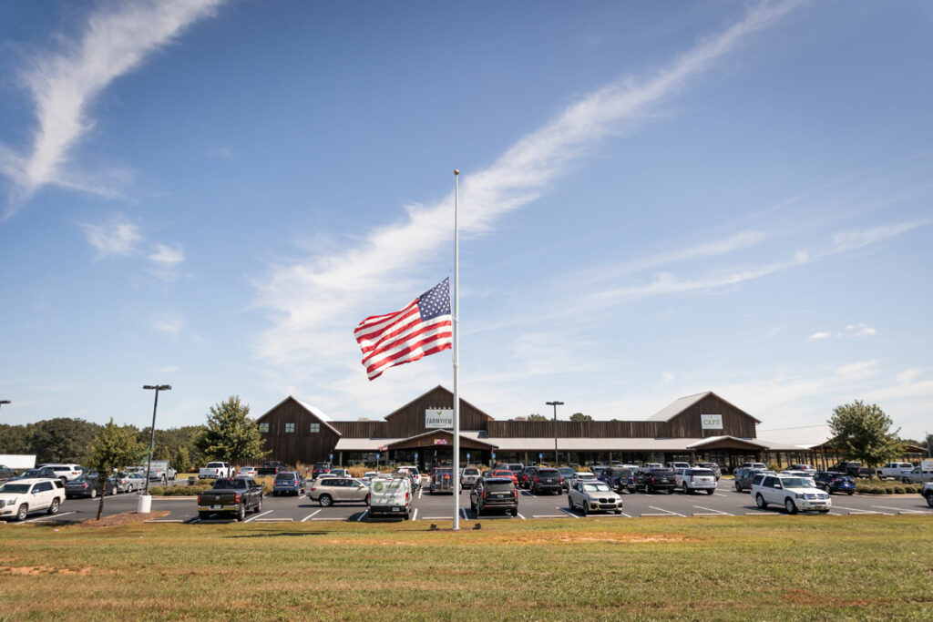 "American flag flying in front of Farmview Market."