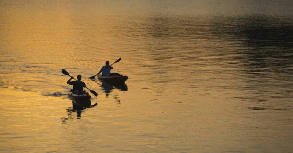 Kayakers on Lake Oconee at sunset