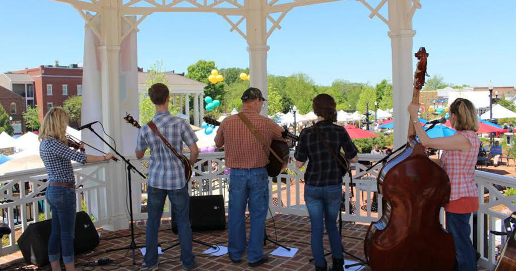 Musicians perform on the gazebo at Madison Fest