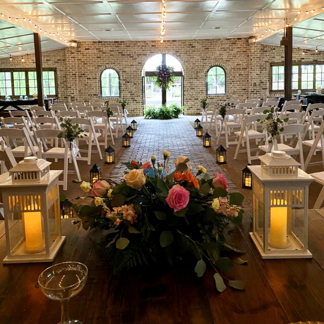 Chairs and decorations set for an indoor wedding