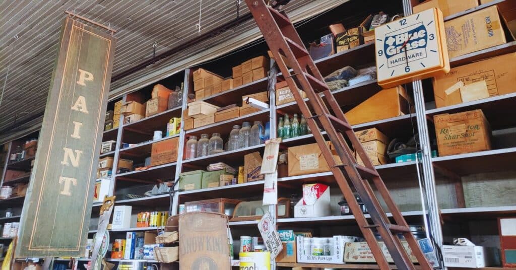 Rolling ladder along high shelves at the Rutledge Hardware Store.