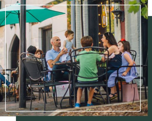 Family dining outdoors in Madison, GA.