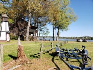Blue Springs Marina with a lighthouse and cabin in Buckhead, GA (Morgan County).