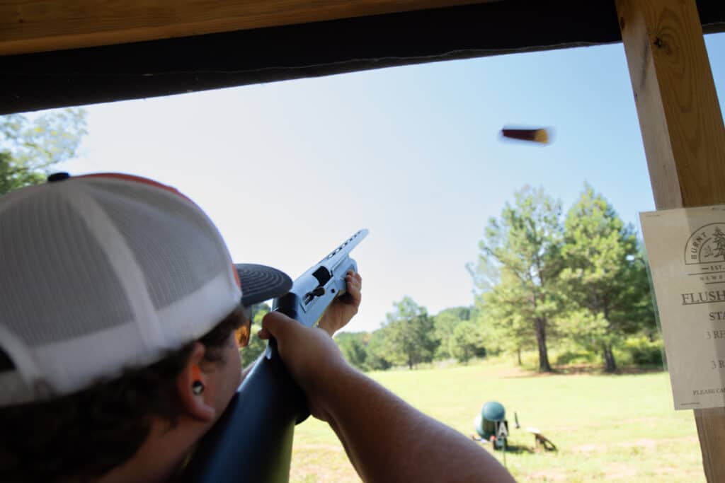 Man aims for target at sporting clays station located at Burnt Pine in Morgan County, Georgia.