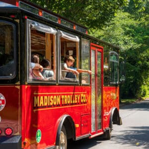 Children pointing through Trolley windows in Historic Madison, Georgia